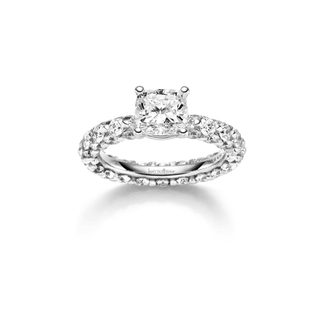 Solitärring in Weißgold mit rundum diamantbesetzter Schiene